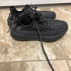 Black kids size Yeezys